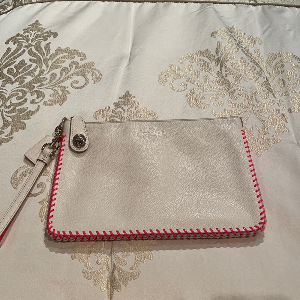 Charming Coach clutch in white and pink
